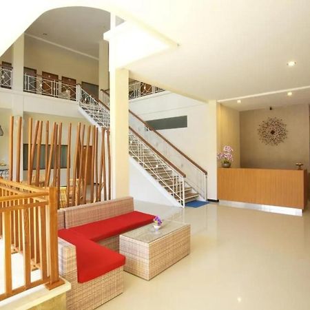 Kuta Suci Guesthouse ภายนอก รูปภาพ