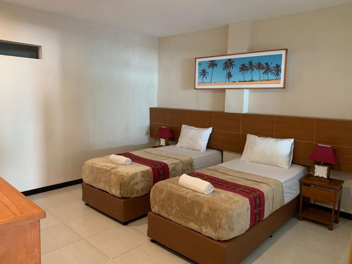 Kuta Suci Guesthouse ภายนอก รูปภาพ
