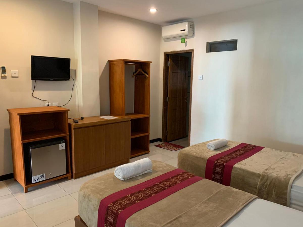 Kuta Suci Guesthouse ภายนอก รูปภาพ