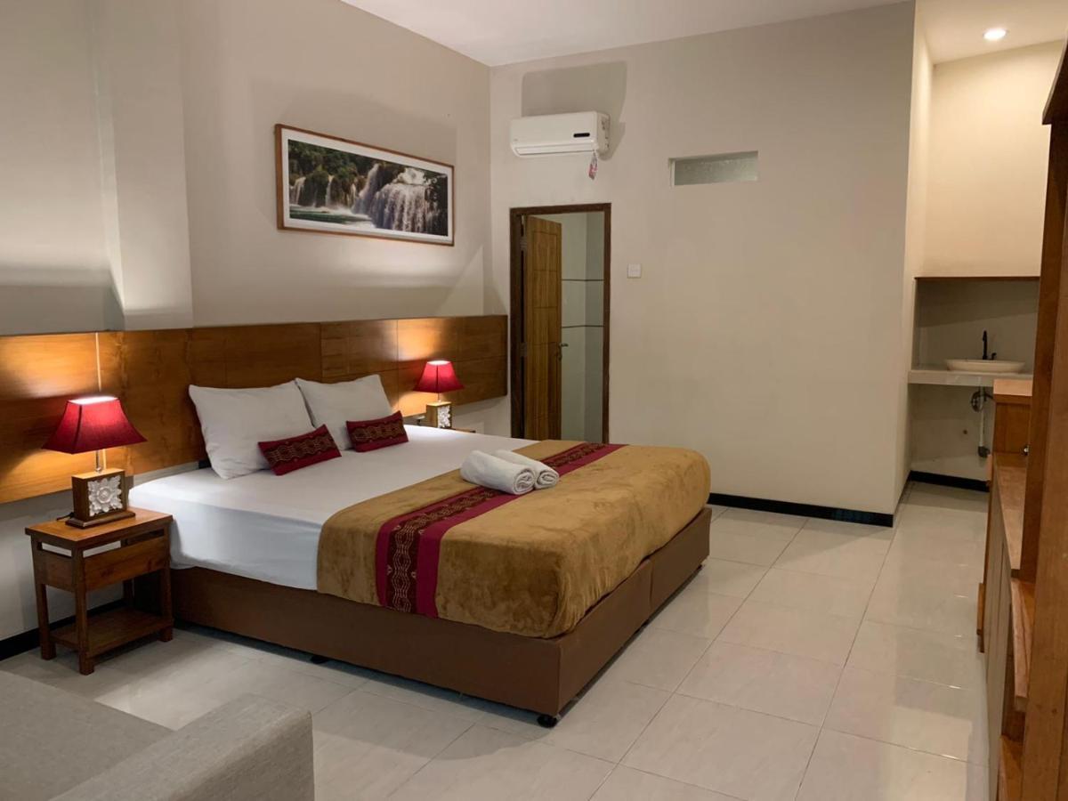 Kuta Suci Guesthouse ภายนอก รูปภาพ