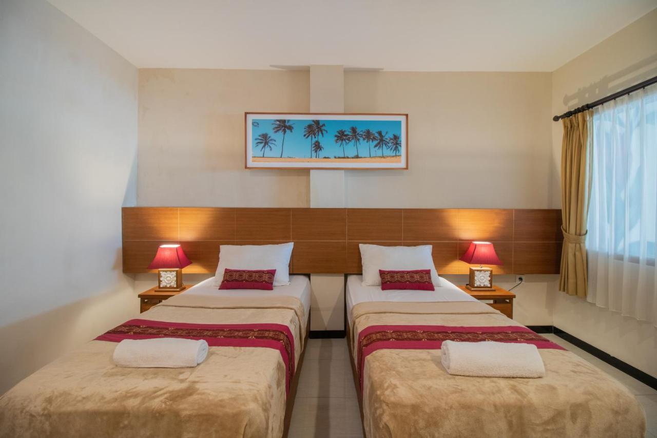 Kuta Suci Guesthouse ภายนอก รูปภาพ