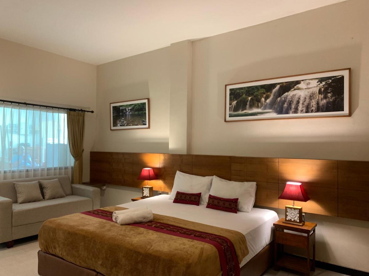 Kuta Suci Guesthouse ภายนอก รูปภาพ