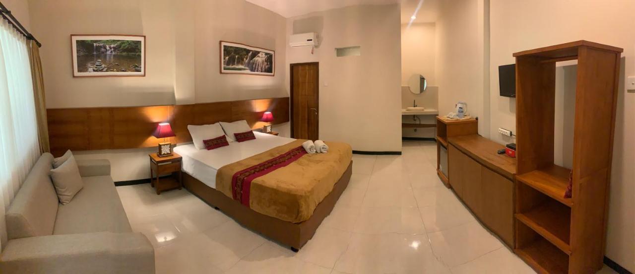 Kuta Suci Guesthouse ภายนอก รูปภาพ