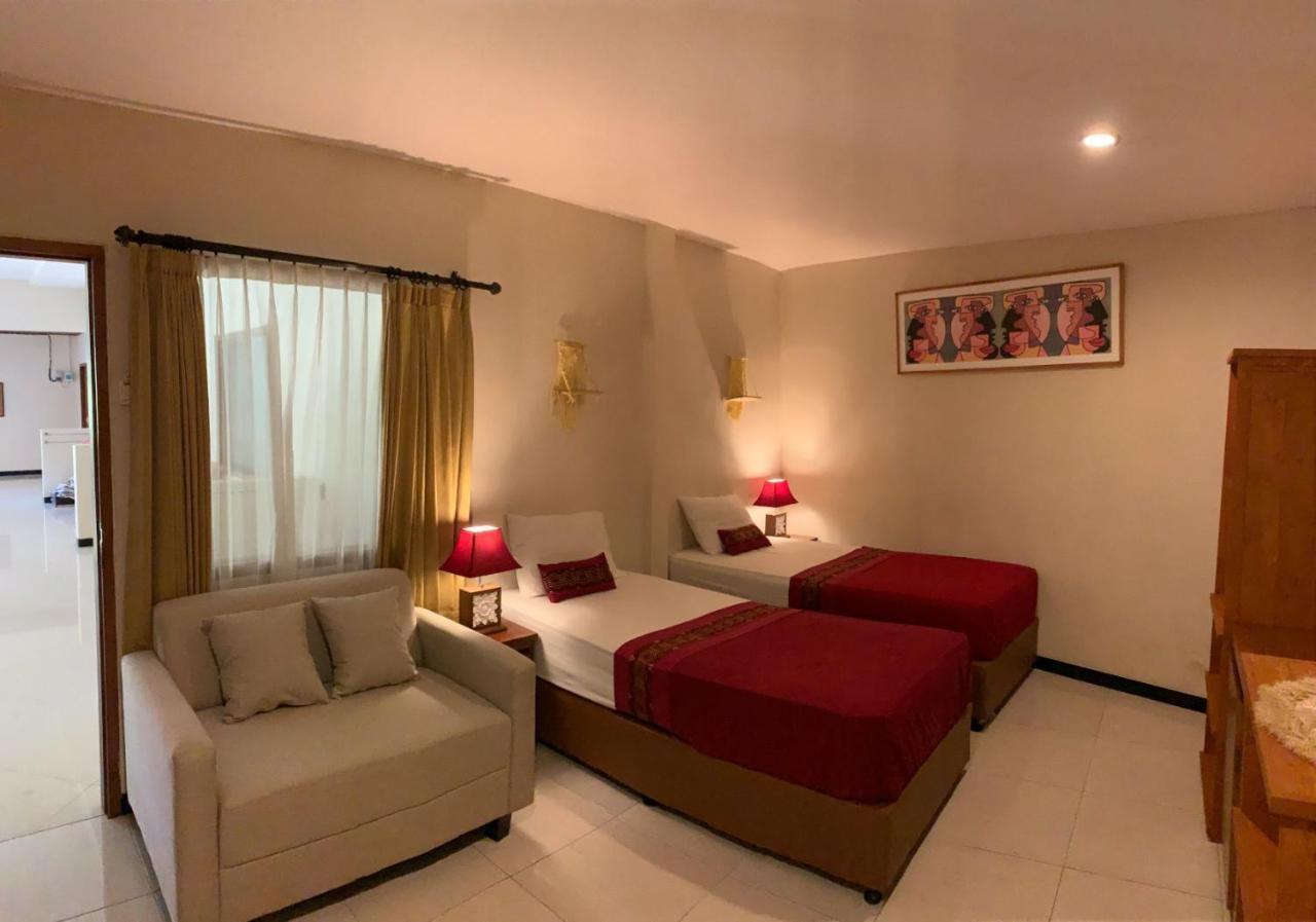 Kuta Suci Guesthouse ภายนอก รูปภาพ