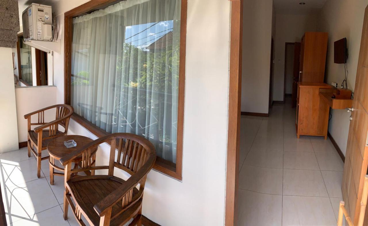 Kuta Suci Guesthouse ภายนอก รูปภาพ