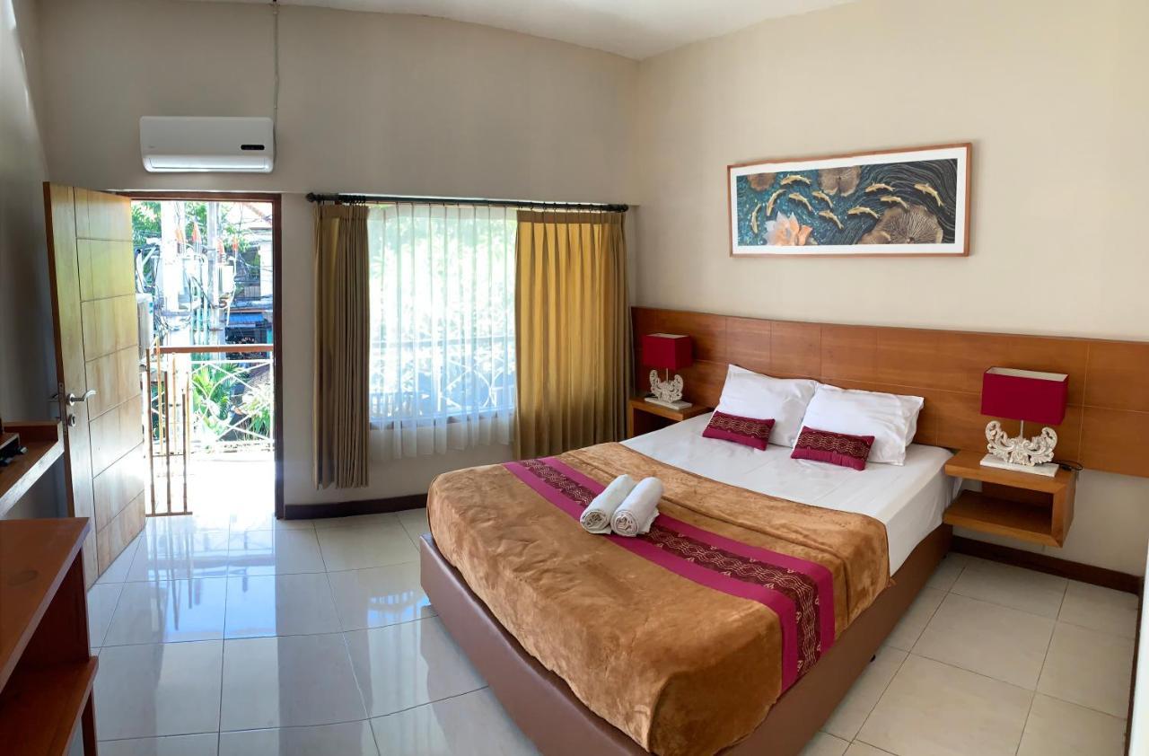Kuta Suci Guesthouse ภายนอก รูปภาพ