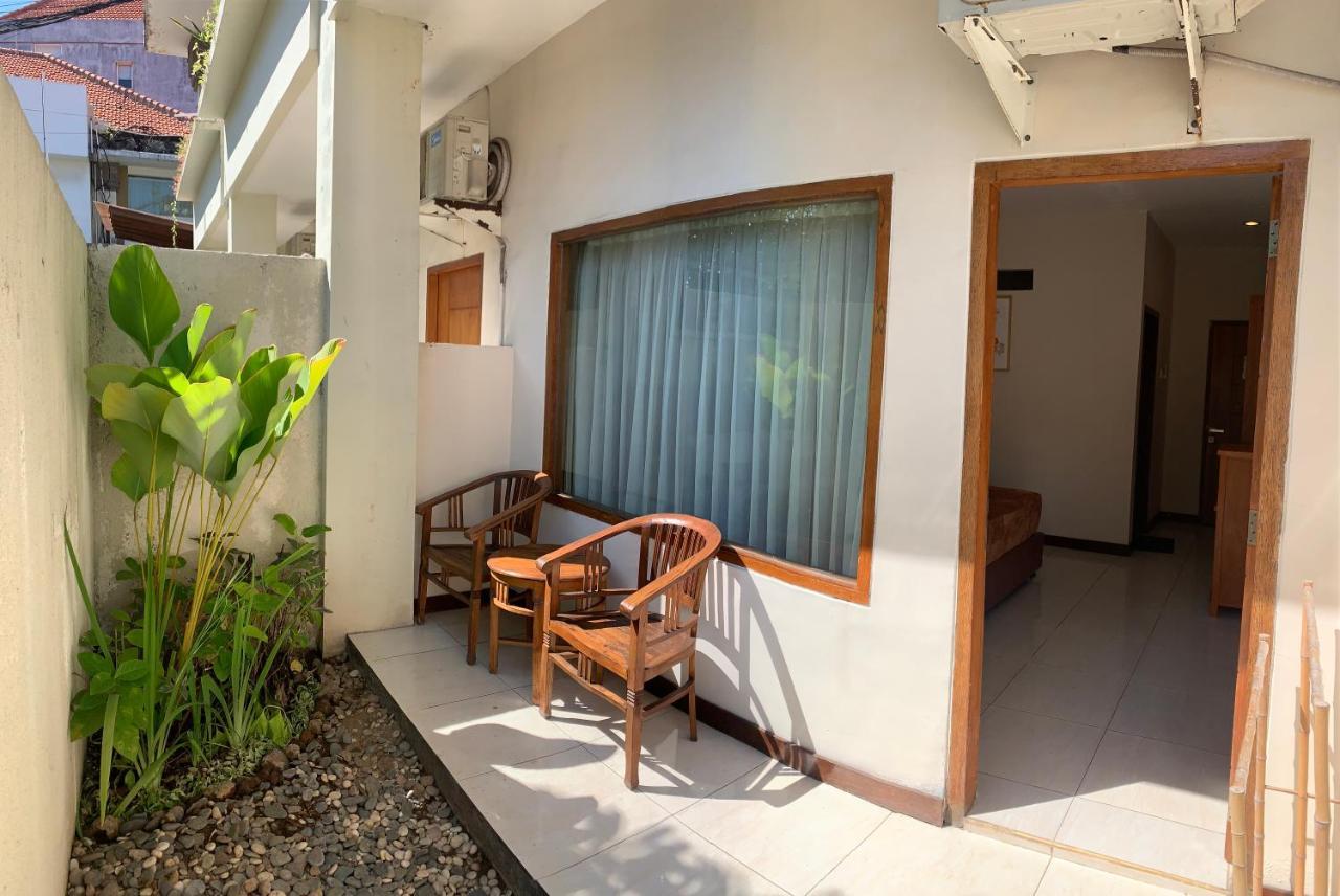 Kuta Suci Guesthouse ภายนอก รูปภาพ
