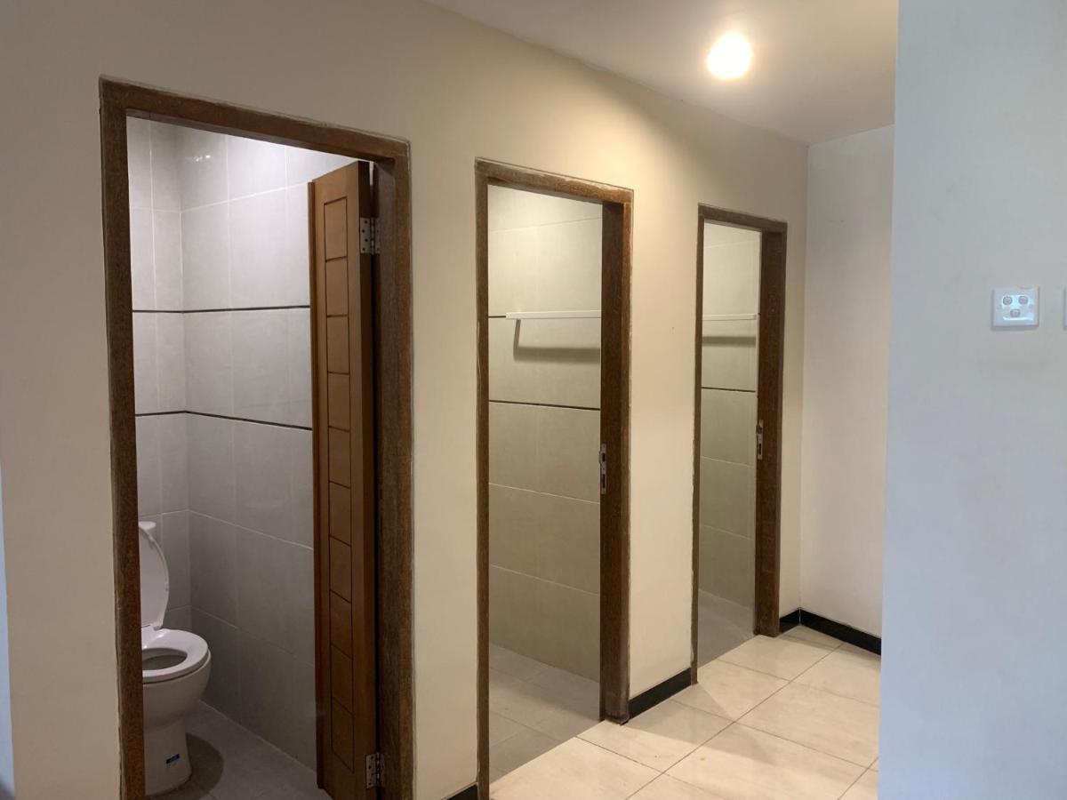 Kuta Suci Guesthouse ภายนอก รูปภาพ
