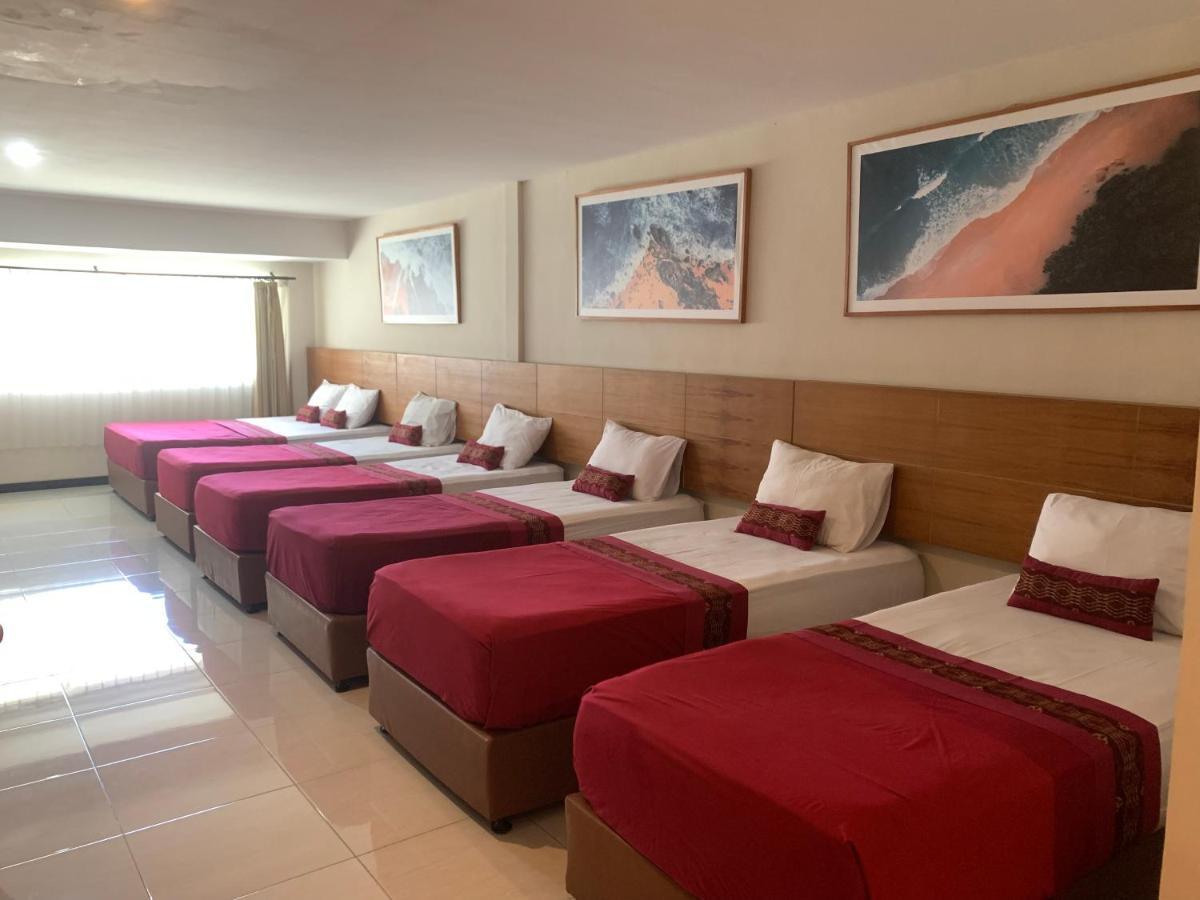 Kuta Suci Guesthouse ภายนอก รูปภาพ