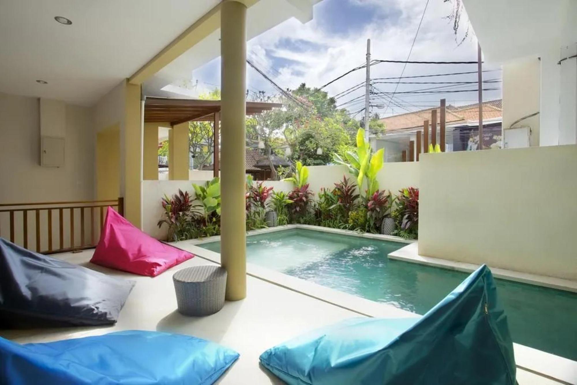 Kuta Suci Guesthouse ภายนอก รูปภาพ