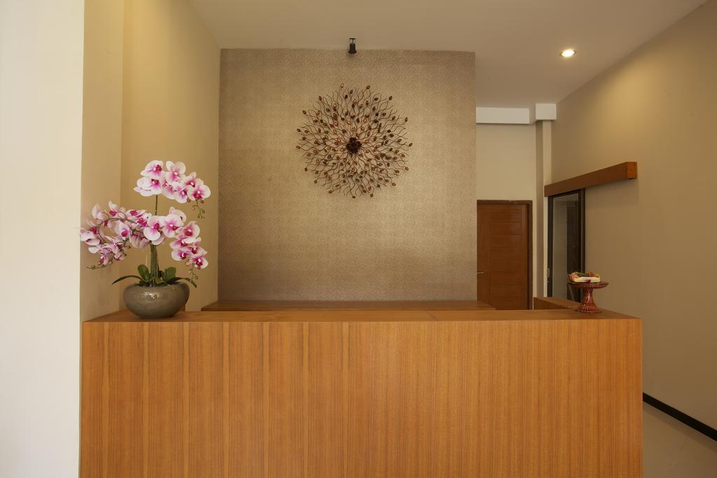 Kuta Suci Guesthouse ภายนอก รูปภาพ