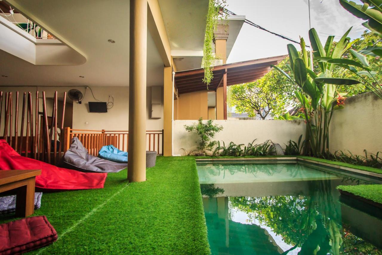 Kuta Suci Guesthouse ภายนอก รูปภาพ