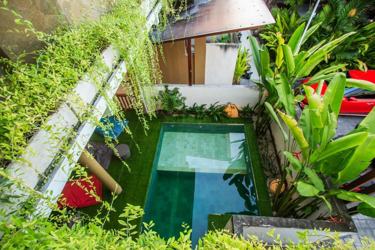 Kuta Suci Guesthouse ภายนอก รูปภาพ