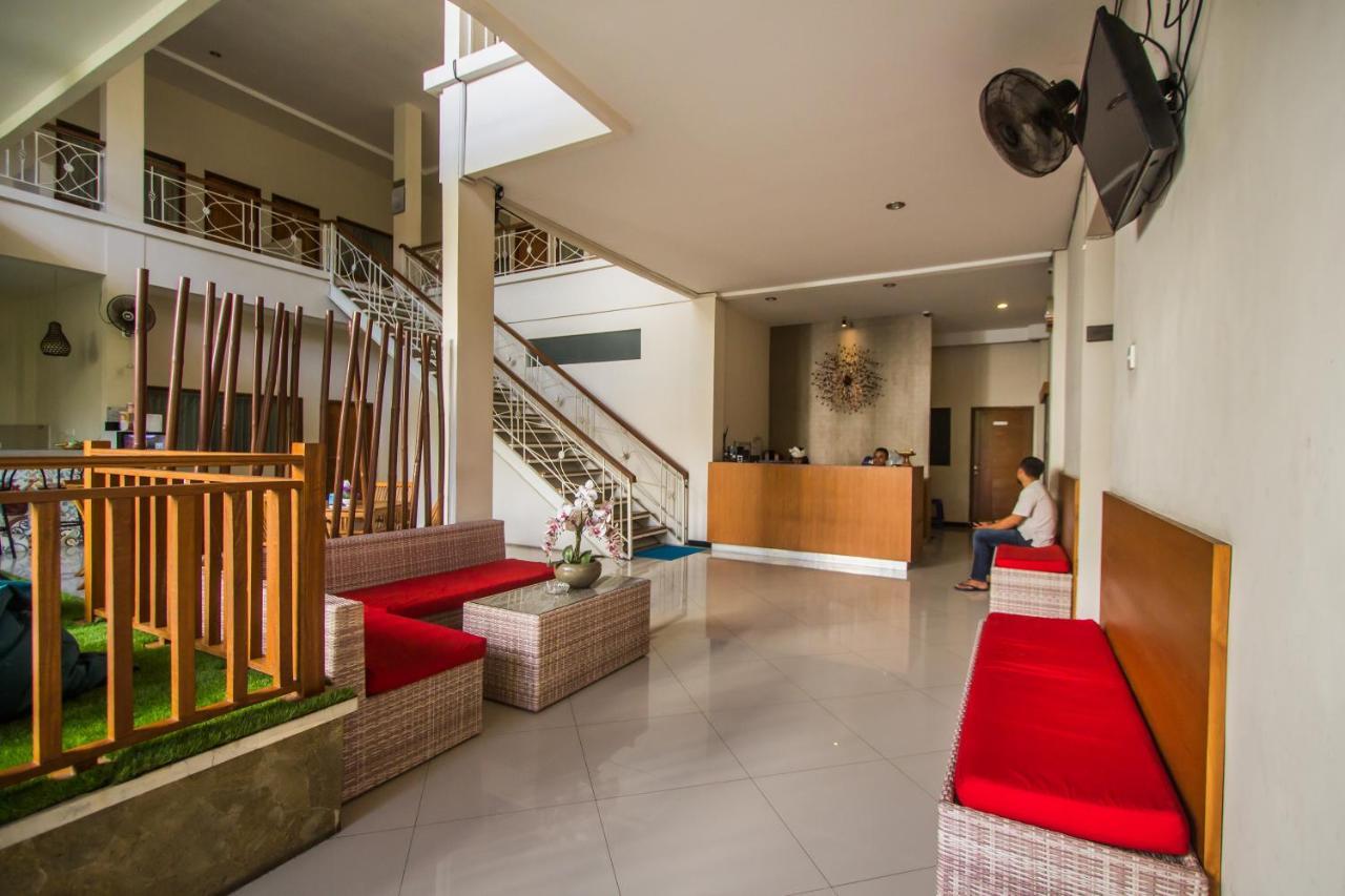 Kuta Suci Guesthouse ภายนอก รูปภาพ
