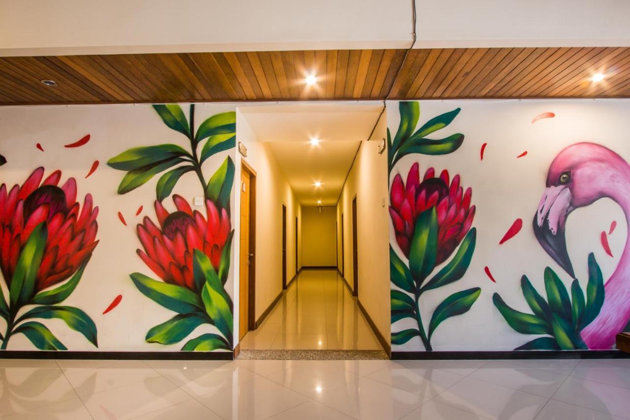 Kuta Suci Guesthouse ภายนอก รูปภาพ