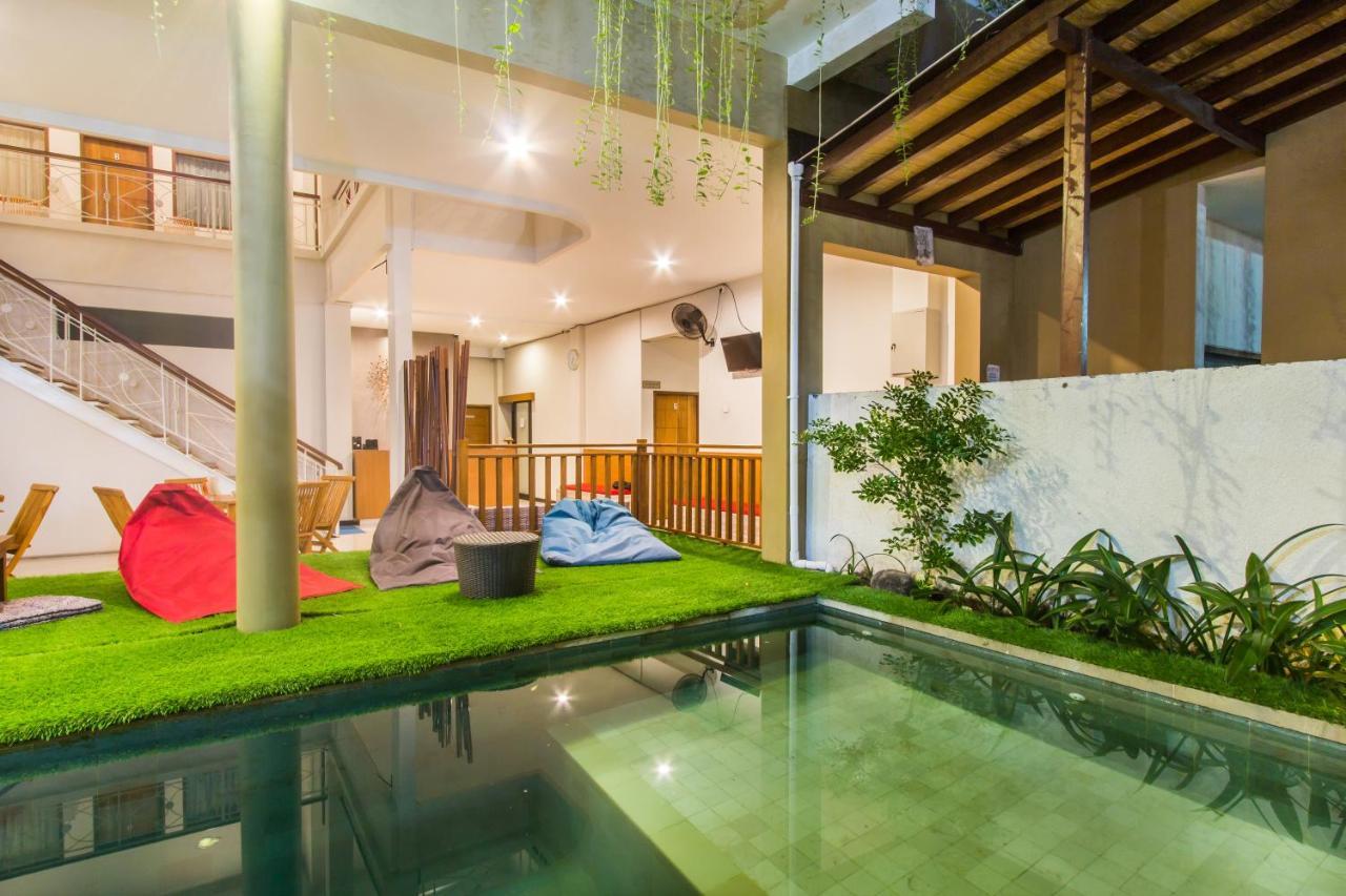 Kuta Suci Guesthouse ภายนอก รูปภาพ
